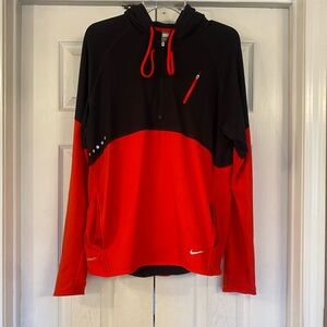 Nike Men's Performance Jacket in Black and Red/Orange